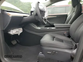 2024 Tesla Model Y с VIN 7SAYGDED2RF040079, выставлен на аукционе Copart как лот 61415675 с пробегом 2 549 миль миль и На запчасти • Non repairable. История ставок и продаж доступна на DreamBid. Изображение 7.