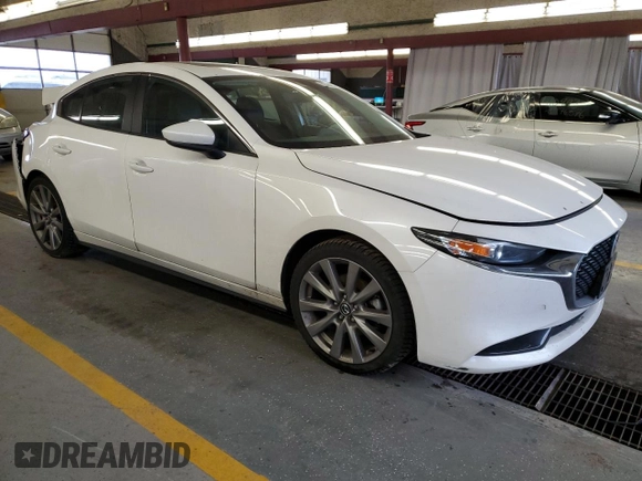 2021 Mazda 3 Preferred with VIN 3MZBPBCM2MM208721, listed as a Copart auction lot 82787294 with 96,891 mi miles and Salvage Title. Bid and sale history available at DreamBid. Image 4.