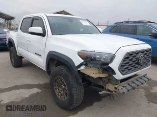 2023 Toyota Tacoma 4WD SR with VIN 3TMCZ5AN0PM534472, listed as a IAAI auction lot 42056291 with 41,910 mi miles. Bid and sale history available at carsss.com. Image 1.