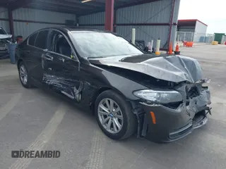 2014 BMW 5 Series 528i with VIN WBA5A5C52ED503033, listed as a IAAI auction lot 41562997 with 127,564 mi miles. Bid and sale history available at carsss.com. Image 1.