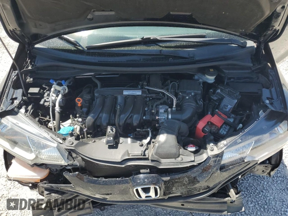 2015 Honda Fit LX z VIN 3HGGK5H52FM759746, wystawiony jako Copart lot #60486535 z przebiegiem 64 295 mil mil oraz Szkoda całkowita • Salvage title. Historia ofert i sprzedaży dostępna na DreamBid. Obrazek 11.