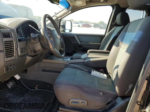 2006 Nissan Titan SE with VIN 1N6BA06B96N521452, listed as a Copart auction lot 70101084 with 197,101 mi miles and Salvage Title. Bid and sale history available at DreamBid. Image 7.