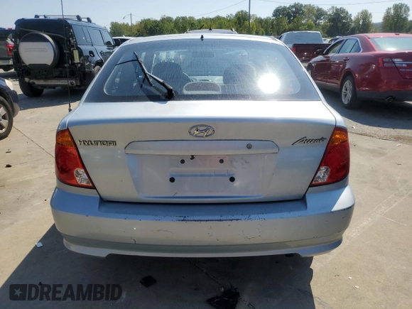 2003 Hyundai Accent GL with VIN KMHCG35CX3U274974, listed as a Copart auction lot 68807494 with 133,791 mi miles and Non Repairable. Bid and sale history available at carsss.com. Image 6.
