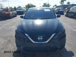 2018 Nissan Sentra S with VIN 3N1AB7AP2JY326055, listed as a IAAI auction lot 42221477 with 123,570 mi miles and . Bid and sale history available at DreamBid. Image 6.