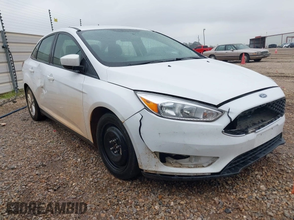 2018 Ford Focus SE z VIN 1FADP3F23JL225333, wystawiony jako IAAI lot #41758445 z przebiegiem 133 307 mil mil oraz . Historia ofert i sprzedaży dostępna na DreamBid. Obrazek 1.