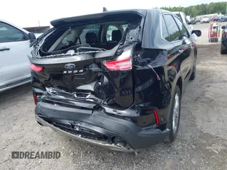 2021 Ford Edge Titanium z VIN 2FMPK3K99MBA16882, wystawiony jako IAAI lot #42214606 z przebiegiem 140 031 mil mil oraz . Historia ofert i sprzedaży dostępna na DreamBid. Obrazek 19.
