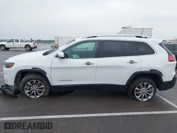 2021 Jeep Cherokee Latitude Lux z VIN 1C4PJMMX4MD221786, wystawiony jako IAAI lot #42432825 z przebiegiem 54 297 mil mil oraz . Historia ofert i sprzedaży dostępna na DreamBid. Obrazek 14.