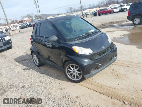 2009 Smart fortwo Passion z VIN WMEEK31X29K288815, wystawiony jako IAAI lot #40953956 z przebiegiem Nie podano mil oraz . Historia ofert i sprzedaży dostępna na DreamBid. Obrazek 1.