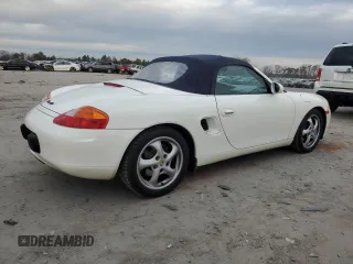2000 Porsche Boxster z VIN WP0CA2980YU622861, wystawiony jako Copart lot #78993794 z przebiegiem 129 631 mil mil oraz Czysty tytuł • Clean title. Historia ofert i sprzedaży dostępna na DreamBid. Obrazek 3.