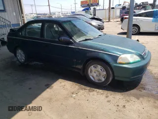 1998 Honda Civic DX with VIN JHMEJ6625WS000750, listed as a Copart auction lot 62486554 with 149,369 mi miles and Salvage Title. Bid and sale history available at DreamBid. Image 4.