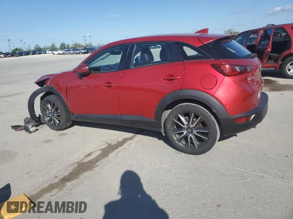 2017 Mazda CX-3 Touring z VIN JM1DKDC75H0170331, wystawiony jako Copart lot #51997455 z przebiegiem 141 405 mil mil oraz Szkoda całkowita • Salvage title. Historia ofert i sprzedaży dostępna na DreamBid. Obrazek 2.