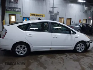 2008 Toyota Prius z VIN JTDKB20UX83407612, wystawiony jako IAAI lot #41141030 z przebiegiem 240 479 mil mil oraz . Historia ofert i sprzedaży dostępna na DreamBid. Obrazek 13.