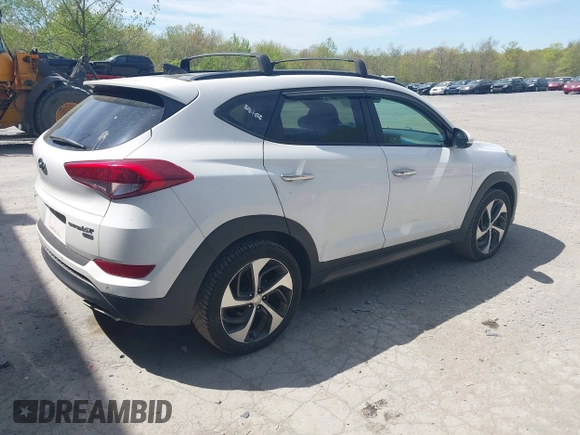 2016 Hyundai Tucson Eco with VIN KM8J3CA22GU076489, listed as a IAAI auction lot 42169732 with 153,597 mi miles. Bid and sale history available at carsss.com. Image 4.