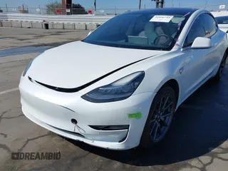 2020 Tesla Model 3 Standard Range Plus with VIN 5YJ3E1EA4LF805205, listed as a IAAI auction lot 41850744 with Not Provided miles. Bid and sale history available at carsss.com. Image 6.