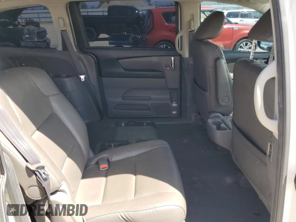 2017 Honda Odyssey Touring z VIN 5FNRL5H93HB015863, wystawiony jako Copart lot #56926815 z przebiegiem 267 380 mil mil oraz Szkoda całkowita • Salvage title. Historia ofert i sprzedaży dostępna na DreamBid. Obrazek 11.