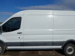 2020 Ford Transit Cargo with VIN 1FTBR1C8XLKB39681, listed as a IAAI auction lot 41304260 with 87,316 mi miles and . Bid and sale history available at DreamBid. Image 14.