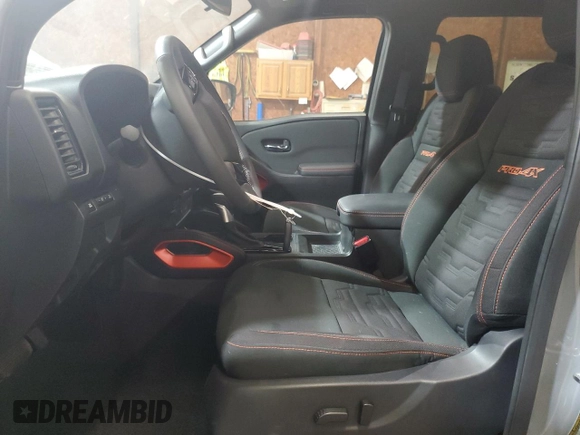 2024 Nissan Frontier SV with VIN 1N6ED1EK4RN620101, listed as a Copart auction lot 61064595 with 11,929 mi miles and Salvage title. Bid and sale history available at DreamBid. Image 7.