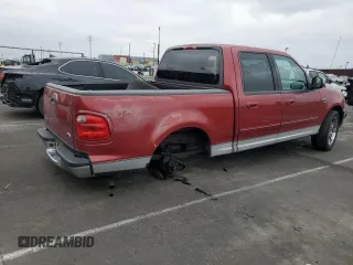 2001 Ford F-150 XLT with VIN 1FTRW07WX1KE51166, listed as a Copart auction lot 60164025 with 157,035 mi miles and Salvage title. Bid and sale history available at DreamBid. Image 3.