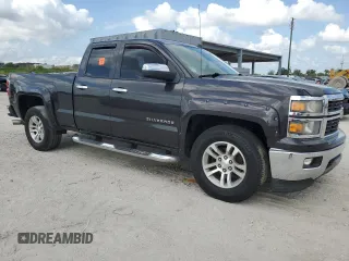 2014 Chevrolet Silverado 1500 LT with VIN 1GCRCREC3EZ180387, listed as a Copart auction lot 56360345 with 134,306 mi miles and Salvage Title. Bid and sale history available at DreamBid. Image 4.