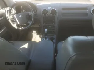 2005 Ford Freestyle SEL z VIN 1FMZK02165GA06824, wystawiony jako Copart lot #57800945 z przebiegiem 145 595 mil mil oraz Szkody całkowita. Historia ofert i sprzedaży dostępna na DreamBid. Obrazek 8.