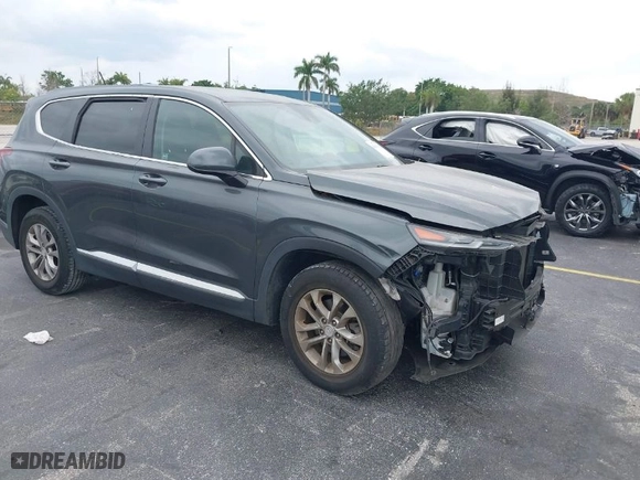 2019 Hyundai Santa Fe SE with VIN 5NMS23AD1KH067456, listed as a IAAI auction lot 41867362 with 105,236 mi miles. Bid and sale history available at carsss.com. Image 1.