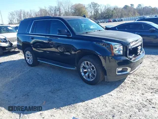 2016 GMC Yukon SLT with VIN 1GKS1BKC3GR467397, listed as a IAAI auction lot 41251557 with 182,465 mi miles. Bid and sale history available at carsss.com. Image 1.
