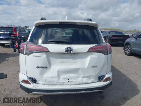 2018 Toyota RAV4 XLE with VIN JTMWFREV7JJ731893, listed as a IAAI auction lot 41567850 with 141,269 mi miles. Bid and sale history available at carsss.com. Image 16.