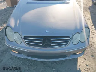 2005 Mercedes-Benz CLK-Class 5.0L with VIN WDBTK75J85F126398, listed as a IAAI auction lot 41890954 with 124,554 mi miles. Bid and sale history available at carsss.com. Image 6.