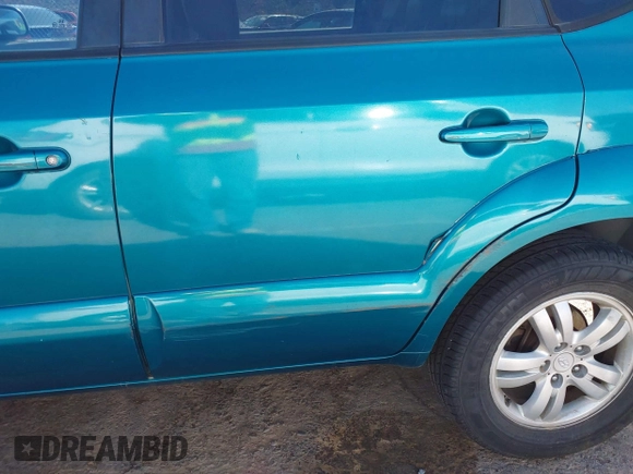 2006 Hyundai Tucson GLS with VIN KM8JN12D86U437446, listed as a IAAI auction lot 41898719 with 216,247 mi miles. Bid and sale history available at carsss.com. Image 6.