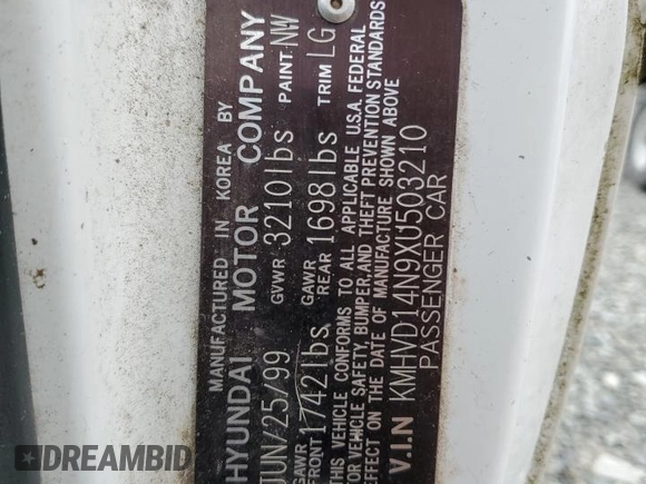 1999 Hyundai Accent with VIN KMHVD14N9XU503210, listed as a Copart auction lot 56486325 with 195,501 mi miles and Salvage title. Bid and sale history available at DreamBid. Image 12.