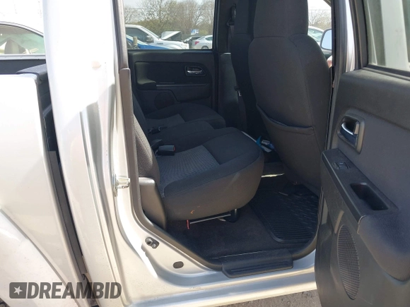 2010 GMC Canyon SLE1 z VIN 1GTJSCDEXA8130361, wystawiony jako IAAI lot #41734671 z przebiegiem 52 621 mil mil oraz . Historia ofert i sprzedaży dostępna na DreamBid. Obrazek 8.