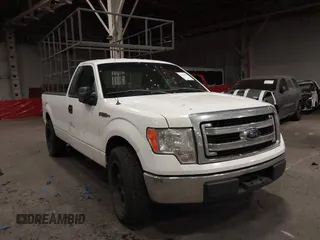 2013 Ford F-150 XL with VIN 1FTNF1CFXDKE79015, listed as a IAAI auction lot 41526331 with 295,919 mi miles. Bid and sale history available at carsss.com. Image 1.