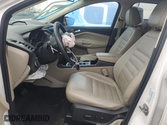 2017 Ford Escape Titanium with VIN 1FMCU0JD1HUE66040, listed as a Copart auction lot 43942665 with 55,484 mi miles and Salvage Title. Bid and sale history available at DreamBid. Image 7.