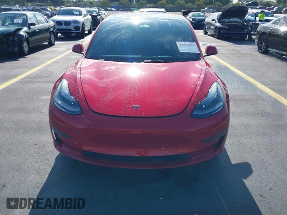 2023 Tesla Model 3 with VIN 5YJ3E1EA2PF588467, listed as a IAAI auction lot 42254921 with 11,217 mi miles and . Bid and sale history available at DreamBid. Image 13.