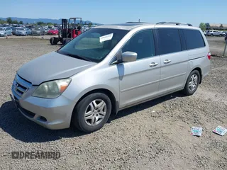 2006 Honda Odyssey EX-L with VIN 5FNRL38726B424923, listed as a IAAI auction lot 42099212 with 171,749 mi miles. Bid and sale history available at carsss.com. Image 2.