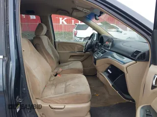 2005 Honda Odyssey EX with VIN 5FNRL38465B108123, listed as a IAAI auction lot 41961270 with 169,948 mi miles. Bid and sale history available at carsss.com. Image 5.