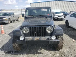 1997 Jeep Wrangler Sahara with VIN 1J4FY49S2VP495910, listed as a Copart auction lot 47794585 with 147,420 mi miles and Salvage Title. Bid and sale history available at carsss.com. Image 5.