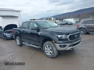 2021 Ford Ranger XL with VIN 1FTER4FH6MLD42153, listed as a IAAI auction lot 41650522 with 77,156 mi miles. Bid and sale history available at carsss.com. Image 1.