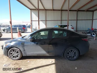 2020 Toyota Yaris Sedan L with VIN 3MYDLBYV4LY716125, listed as a IAAI auction lot 41630523 with 55,282 mi miles. Bid and sale history available at carsss.com. Image 14.
