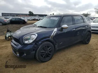 2011 MINI Countryman S with VIN WMWZC5C53BWH99985, listed as a Copart auction lot 89191125 with 90,177 mi miles and Salvage Title. Bid and sale history available at DreamBid. Image 1.