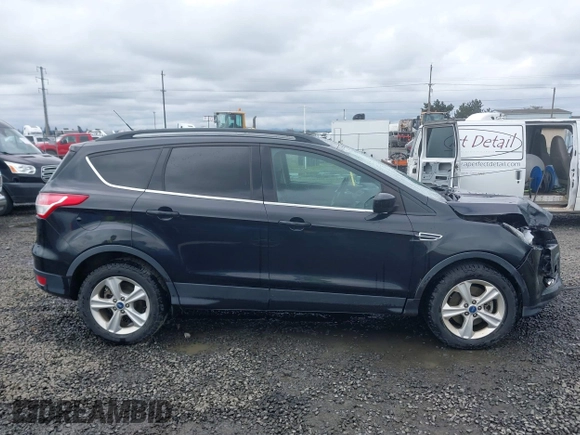 2015 Ford Escape SE with VIN 1FMCU9G98FUA26059, listed as a IAAI auction lot 41991222 with 149,298 mi miles and . Bid and sale history available at DreamBid. Image 14.