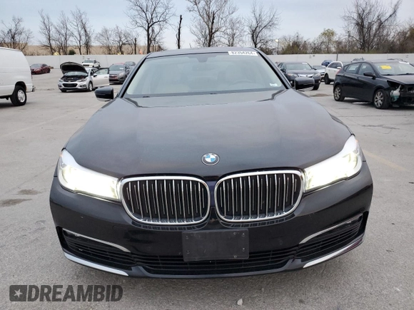 2018 BMW 7 Series 740i xDrive with VIN WBA7E4C50JGV23975, listed as a Copart auction lot 82354264 with 63,657 mi miles and Salvage Title. Bid and sale history available at carsss.com. Image 5.