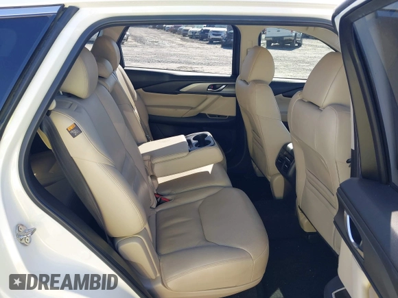 2019 Mazda CX-9 Touring z VIN JM3TCACY3K0333931, wystawiony jako IAAI lot #41968519 z przebiegiem 102 992 mil mil oraz . Historia ofert i sprzedaży dostępna na DreamBid. Obrazek 8.
