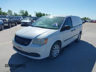 2014 Ram Cargo Van with VIN 2C4RRGAG2ER251245, listed as a IAAI auction lot 42038553 with 230,962 mi miles and . Bid and sale history available at DreamBid. Image 2.