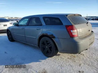 2006 Dodge Magnum R/T z VIN 2D4GV57256H187683, wystawiony jako Copart lot #87879585 z przebiegiem 260 895 mil mil oraz Szkody całkowita. Historia ofert i sprzedaży dostępna na DreamBid. Obrazek 2.