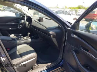 2024 Mazda CX-30 S Select Sport with VIN 3MVDMBBM2RM657781, listed as a IAAI auction lot 42297311 with 13,677 mi miles and . Bid and sale history available at DreamBid. Image 5.