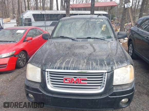 2006 GMC Envoy SLT with VIN 1GKDS13S562199496, listed as a IAAI auction lot 41463065 with 219,473 mi miles. Bid and sale history available at carsss.com. Image 6.