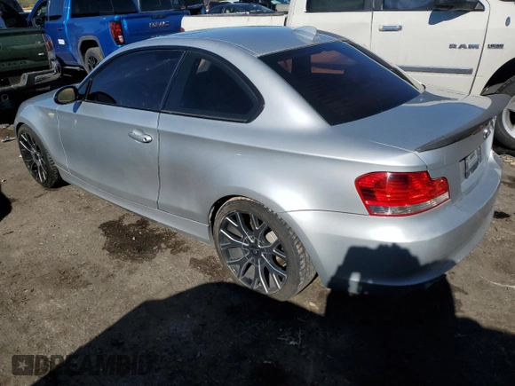 2009 BMW 1 Series 128i with VIN WBAUP93529VF48915, listed as a Copart auction lot 80310034 with 143,208 mi miles and Salvage title. Bid and sale history available at DreamBid. Image 2.