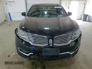 2017 Lincoln MKX Reserve z VIN 2LMPJ8LR3HBL28950, wystawiony jako Copart lot #58655125 z przebiegiem 96 778 mil mil oraz Szkoda całkowita • Salvage title. Historia ofert i sprzedaży dostępna na DreamBid. Obrazek 13.