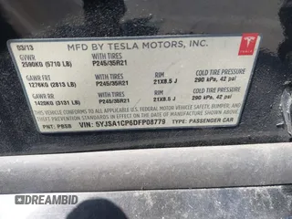 2013 Tesla Model S Performance z VIN 5YJSA1CP6DFP08779, wystawiony jako IAAI lot #42172960 z przebiegiem 136 450 mil mil oraz . Historia ofert i sprzedaży dostępna na DreamBid. Obrazek 9.